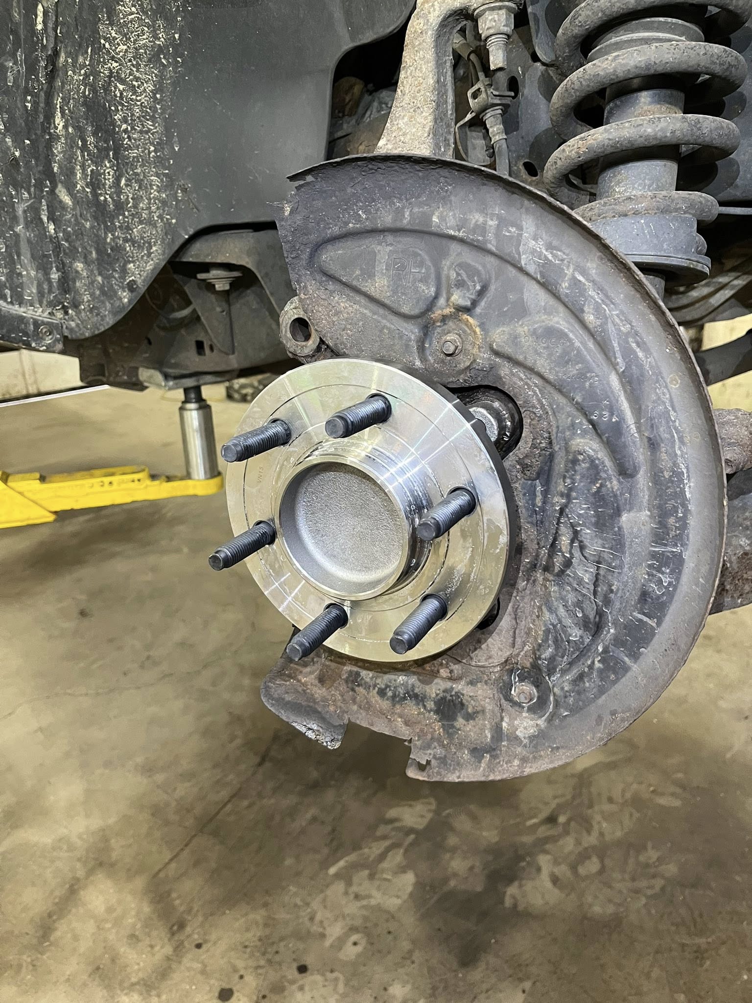New wheel hub installed during brake service at Reedz Auto Repair in Carroll, Ohio