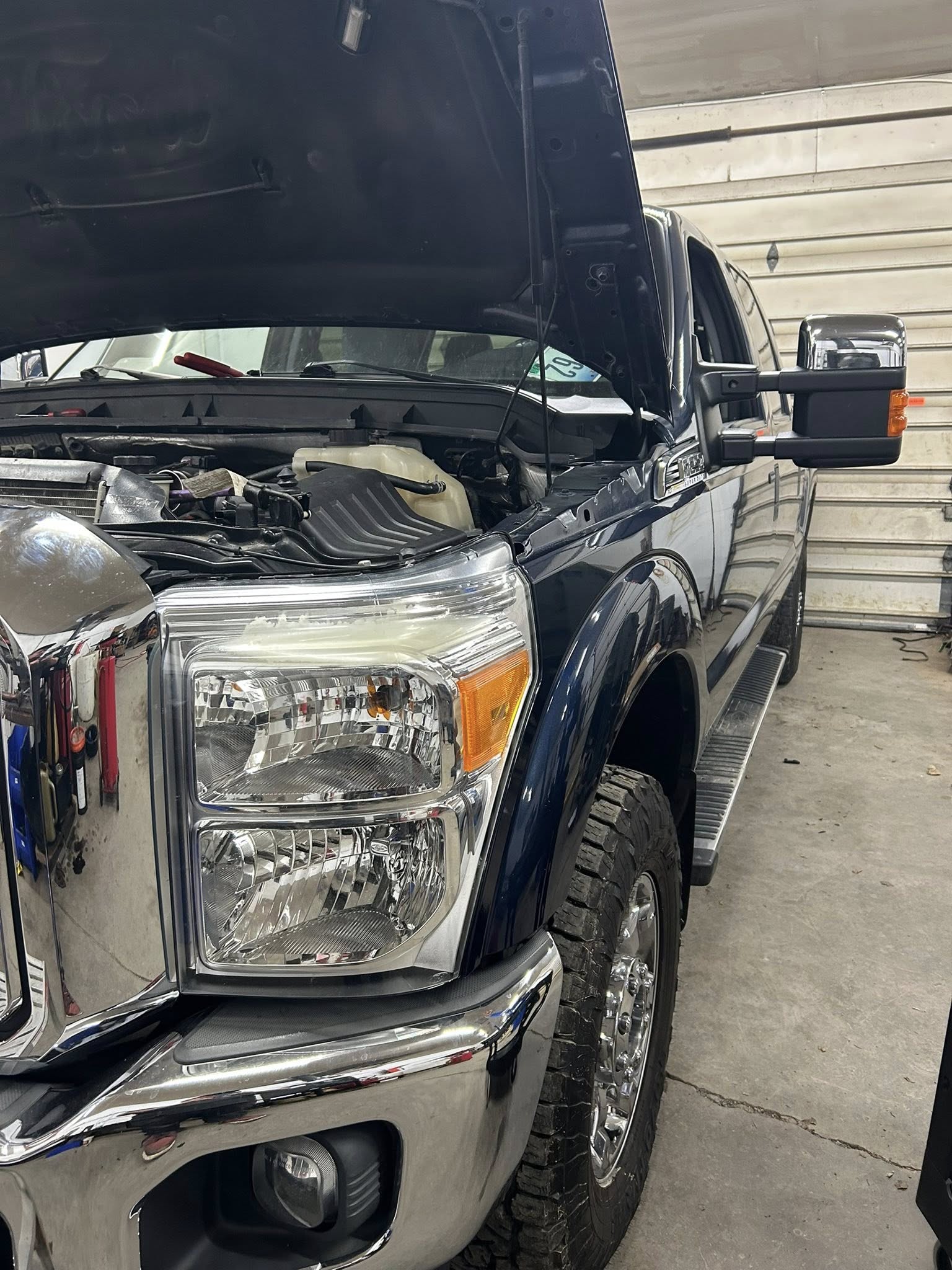 Pickup truck in the shop bay during service at Reedz Auto Repair in Carroll, Ohio